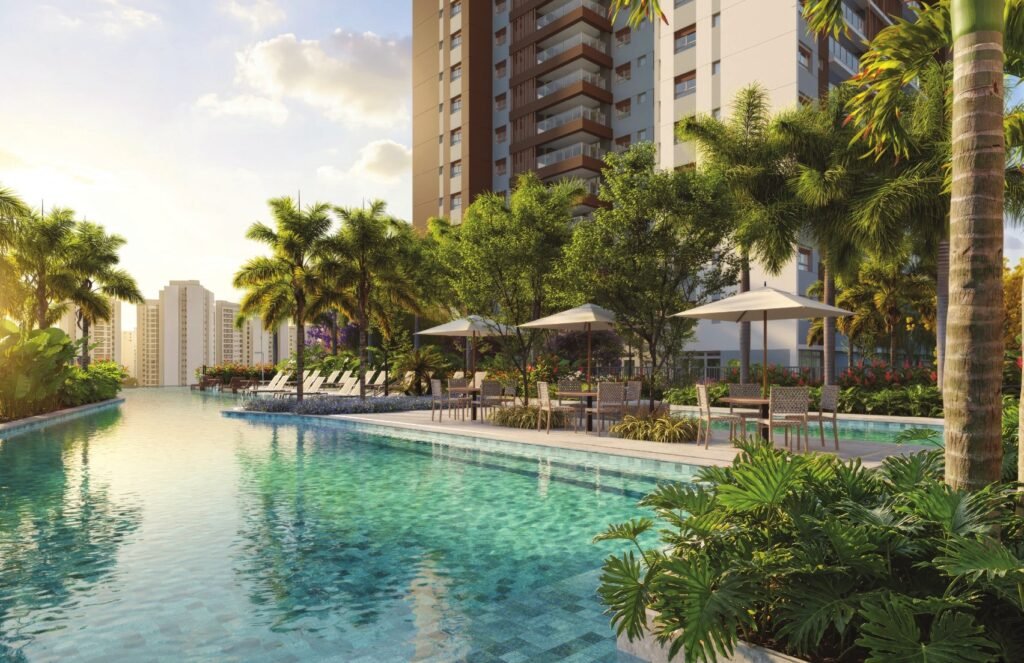 Piscina externa do Sequoia Jardim das Perdizes com espreguiçadeiras e área de convívio