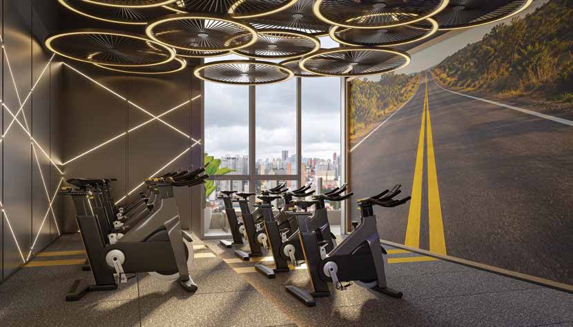 Perspectiva da sala de spinning do 38º pavimento do Town Residences by Lindenberg, com bicicletas enfileiradas e painel luminoso no teto